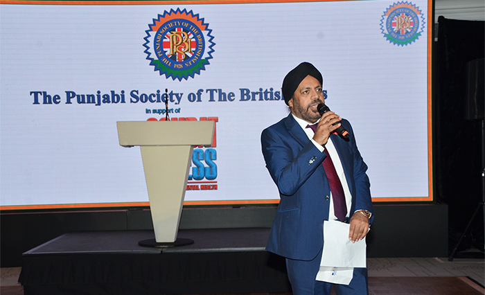 Patron Dr Ravi Gidar helping to raise funds for Combat Stress as the auctioneer for the Charity auction