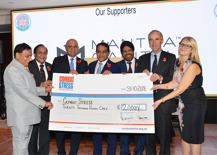 Rt Hon Sajid Javid MP, Home Secretary with the PSBI President Dr Atul Pathak , Vice President , Patrons Dr Rami Ranger CBE and Mr. Anil Sharma and Dr Ravi Gidar presenting the cheque of £20,000 for Combat Stress to Lieutenant General Andrew Graham and Nicola Wearing 