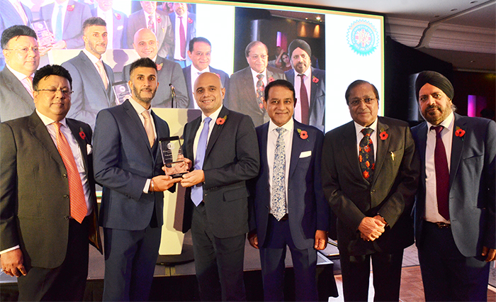Superintendent Davinder Singh Kandohla receiving his Pride of Punjab Award from Rt Hon. Sajid Javid , Home Secretary 