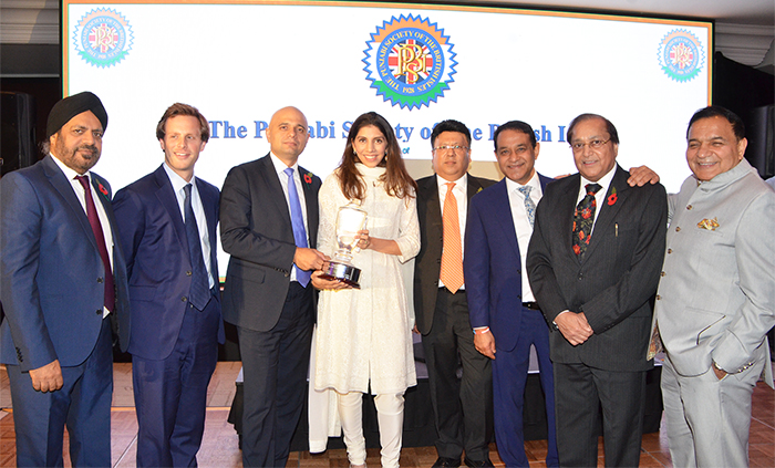 Pride of Punjab Award for Mr. Jasminder Singh OBE, being received by his daughter Krishma Singh from the Home Secretary